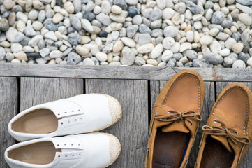 Shoes on a beach boardwalk