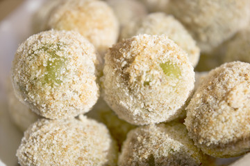 detail of raw stuffed fried olives