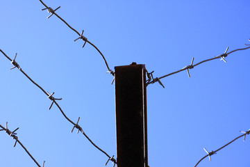 The barbed wire over the wall