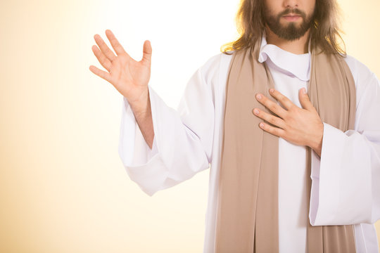 Jesus holding hand on heart