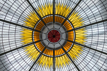 Stained glass ceiling with hub and spoke pattern