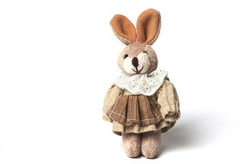 Cute bunny doll over a white background