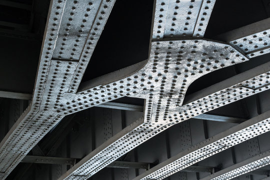 Riveted Steel Beams Supporting Bridge Span