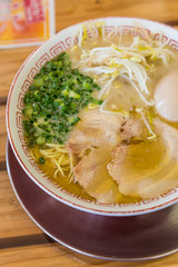 Delicious Japanese chashu ramen with boiled egg and vegetable