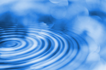 Abstract blue ripples background