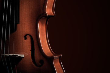 Violin musical instruments of orchestra closeup on black © YB