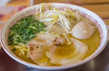 Delicious Japanese chashu ramen with boiled egg and vegetable