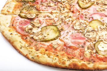 Close up pizza with ham, mushrooms and vegetables