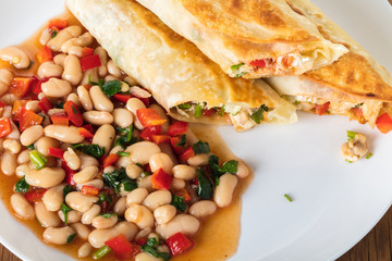 burrito with garnish of beans