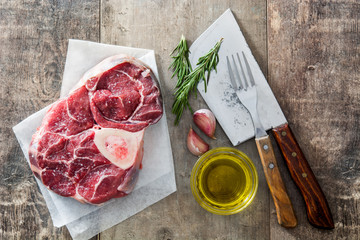 Raw meat on wooden background
