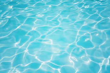 Naklejka na ściany i meble Blue water surface and ripple wave in pool