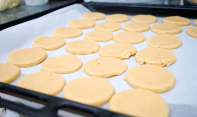Obraz na płótnie Canvas Creating and kneading the dough for gingerbread