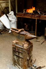 Forge, anvil, knife making.