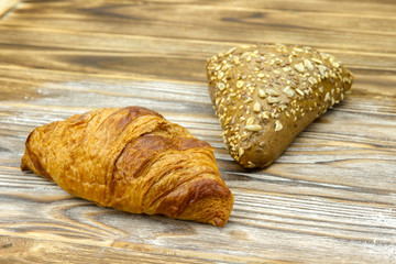 fresh hot croissant with chocolate bakery and bread loaf twelve different kinds of grains