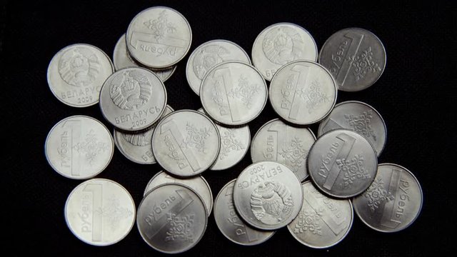 Belarusian coins on black background