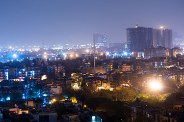 Fototapeta na wymiar Cityscape of Noida Delhi at night with lights and under construction buildings