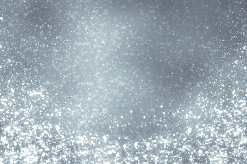 Abstract silver background with white particles. Round bokeh or glitter lights. Design template