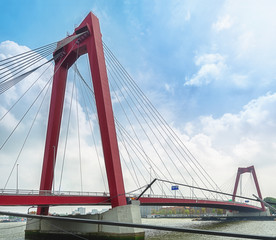 Fototapeta na wymiar The bridge Willemsbrug in Rotterdam