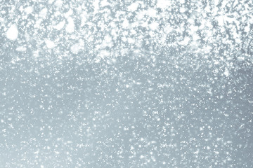 Abstract silver background with white particles. Round bokeh or glitter lights. Design template