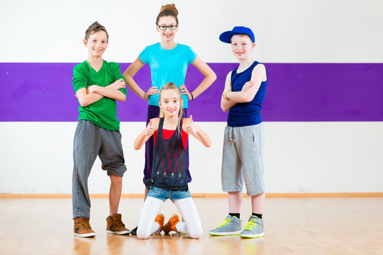 Kids Train Zumba Fitness In Dancing School