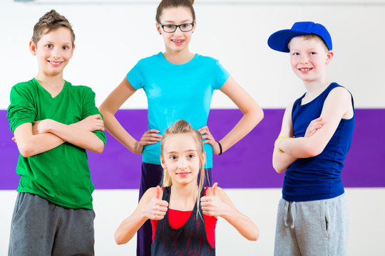 Kids Train Zumba Fitness In Dancing School