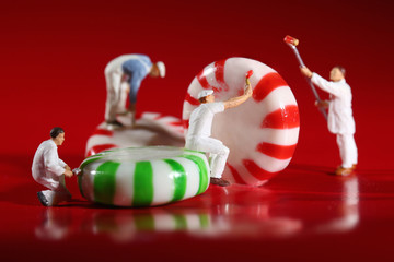 Miniature People Who Paint Colors on Our Candy