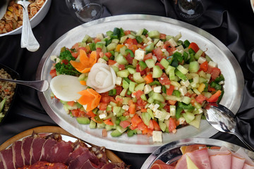 Classic Croatian plate with fine salad with cheese, pepper, cucumber and tomatoes