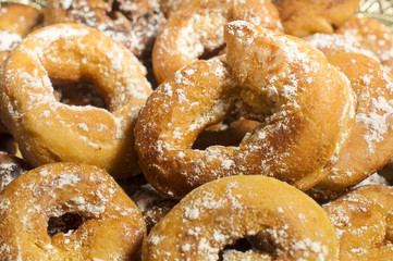 fried donuts of Spain made with dough of flour , yeast, milk, eggs,oil, orange, anise and sugar