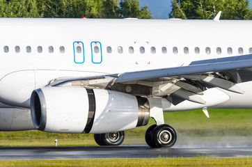 The engine of the airplane on the reverse side near in the rain