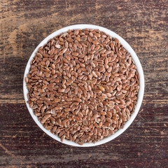 unpeeled linseed / Porcelain bowl with unpeeled linseed