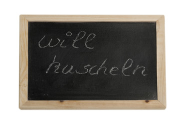 Will kuscheln - Spruch auf Tafel