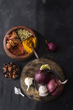Assorted spices and onions 