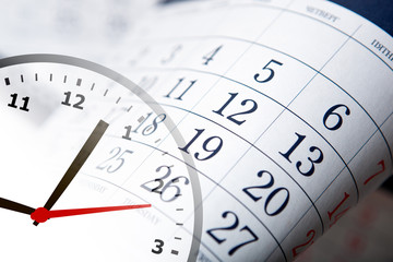 wall calendar with the number of days and clock