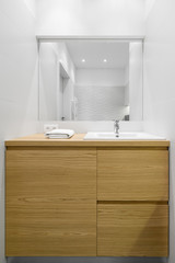 Big wooden drawers in bathroom