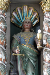 Fototapeta premium Saint Barbara statue at the altar in the church of Saint Catherine of Alexandria in Krapina, Croatia 