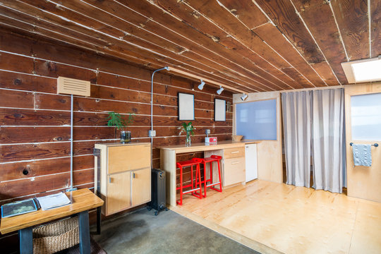 Rustic dining room in a bright cabin. Interior design.