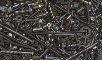 Old, dirty, rusty bolts, nuts and nails
