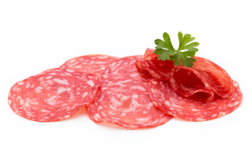 Salami smoked sausage slices isolated on white background cutout.