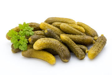 Marinated pickled cucumbers isolated on the white.