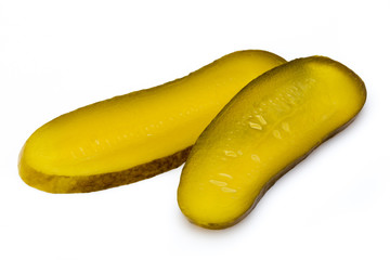 Marinated pickled cucumbers isolated on the white.