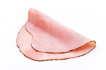 Thin slices of ham on white background.