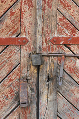 The old door locked with a padlock hanging brackets. Set of backgrounds