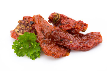 Dried tomatoes isolated on white background.
