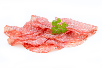 Salami smoked sausage slices isolated on white background cutout.