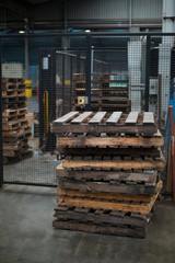 Stack of pallets in factory