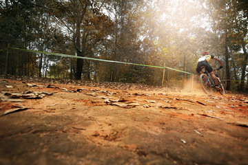 low angle view of cyclist riding mountain bike,sport background.