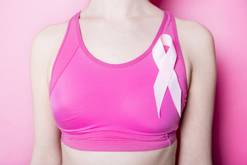Fight for Breast Cancer woman with symbol on pink background