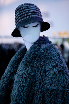 Mannequin in eco-fur coat and hat