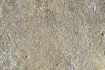 Sand with rubble road