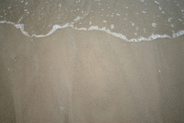 sea wave on sand